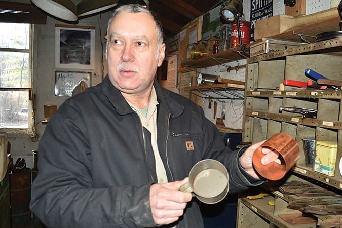 Kevin Riddle is formulating his patterns to make vintage-style copper cups.