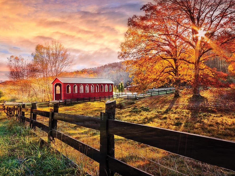 The iconic red wooden covered bridge at Granny’s Squirrel, North Carolina, connects the Cherokee County towns of Murphy and Andrews. Tiny Granny’s Squirrel takes its name from one of the Cherokee Indian women who lived in the area.